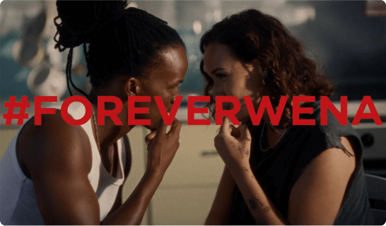 A couple looking at each other with #ForeverWena written in bold red
